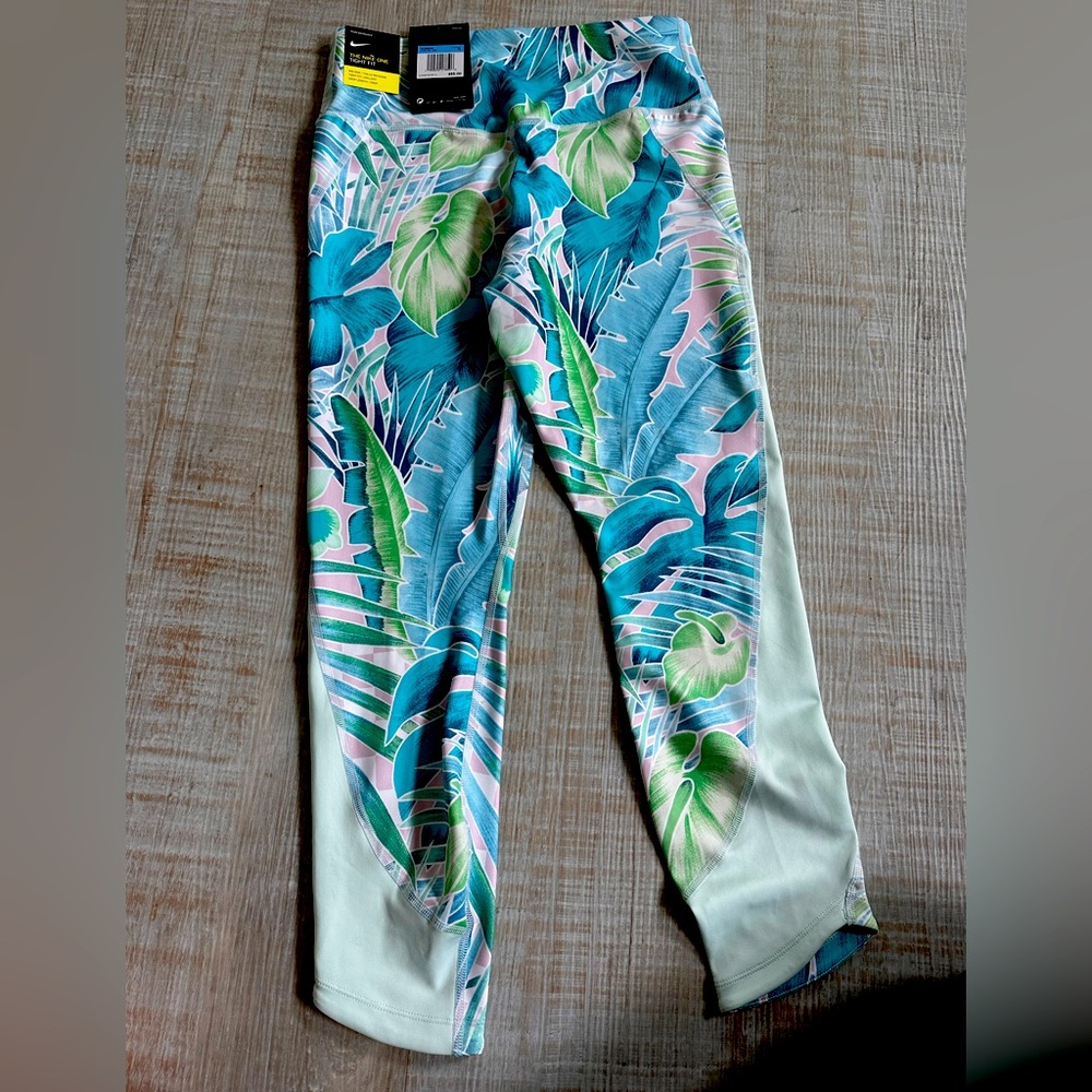 NWT Nike tight fit, mid rise, crop length, Dri-Fit pants. Size medium.